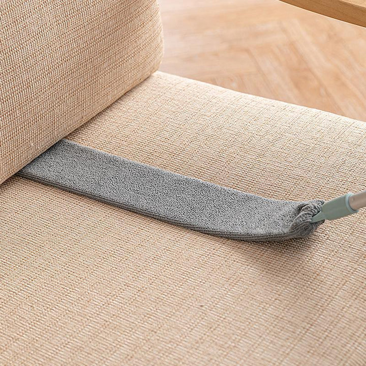 CleanSweep dammborste med mikrofiberduk som samlar damm. Återanvändbar för renare hem.