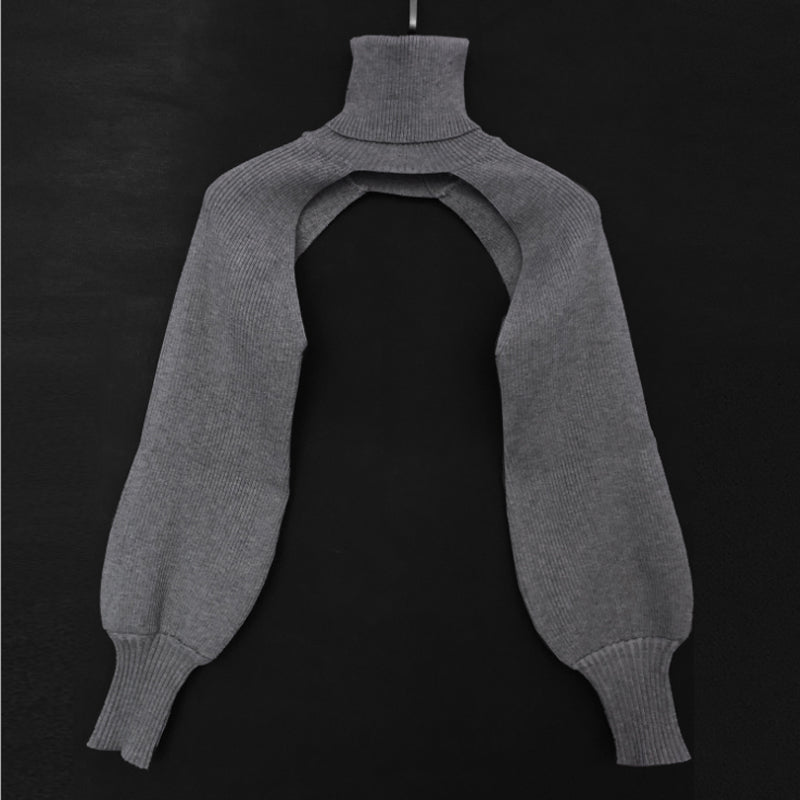 "Coltröja med hög hals och loose bloomer-ärmar, eleganta detaljer för chic look. Perfekt för dammode, olika färgval."