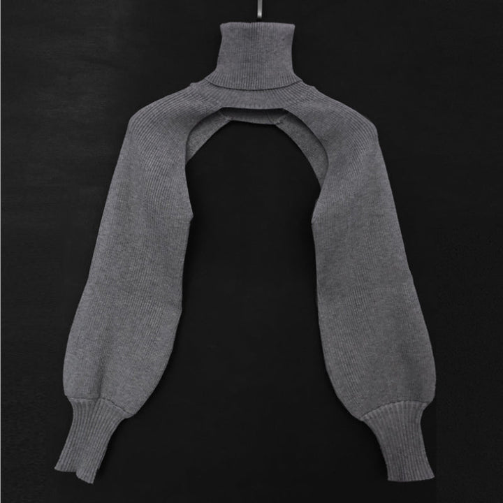 "Coltröja med hög hals och loose bloomer-ärmar, eleganta detaljer för chic look. Perfekt för dammode, olika färgval."