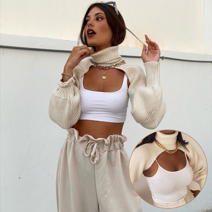 "Coltröja med hög hals och loose bloomer-ärmar, eleganta detaljer för chic look. Perfekt för dammode, olika färgval."