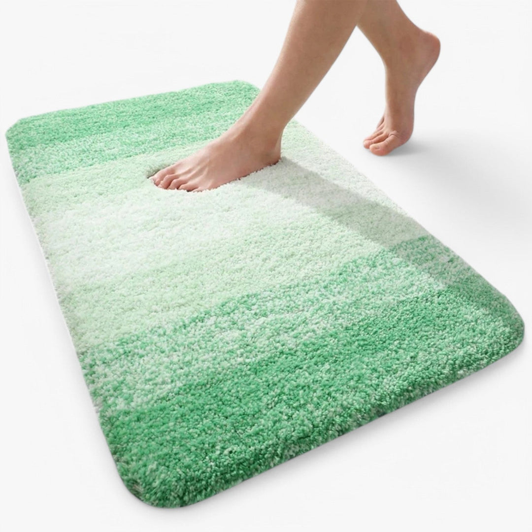 Corinna halkfri badrumsmatta i snygg design. Funktionell mikrofiber för heminredning, absorberar vatten effektivt.