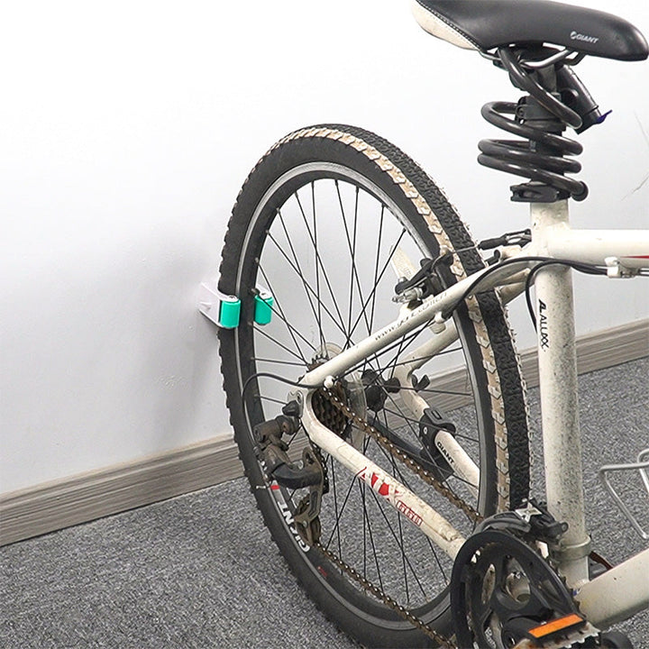 "Cykelställ för parkering av mountainbike och landsvägscykel, kompakt och elegant design, perfekt för cykelentusiaster."