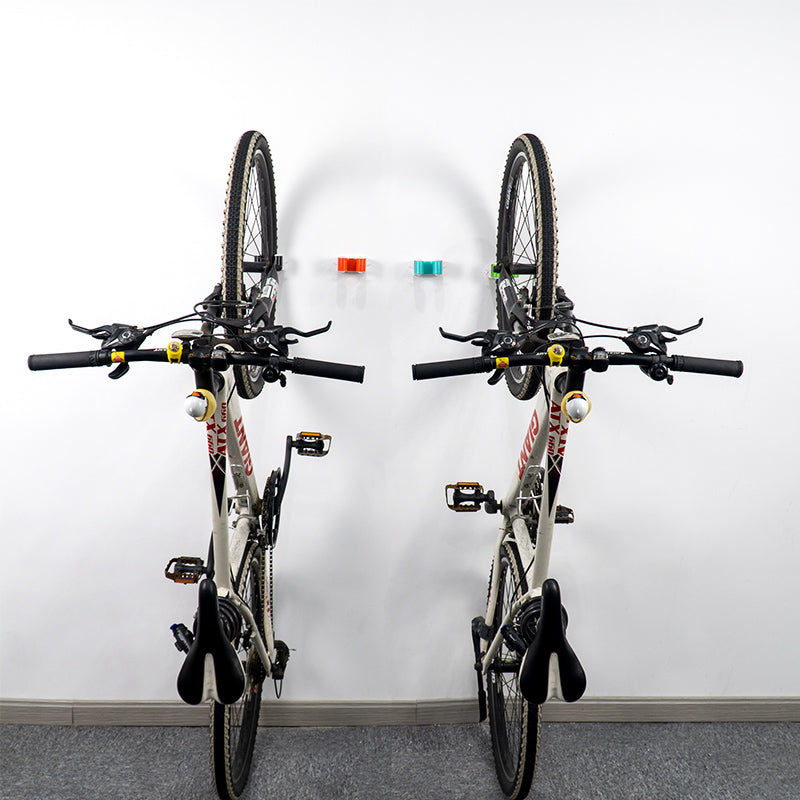 "Cykelställ för parkering av mountainbike och landsvägscykel, kompakt och elegant design, perfekt för cykelentusiaster."