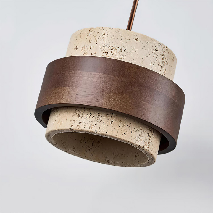 Stilren cylindrisk pendellampa, natursten travertin och valnötsträ.