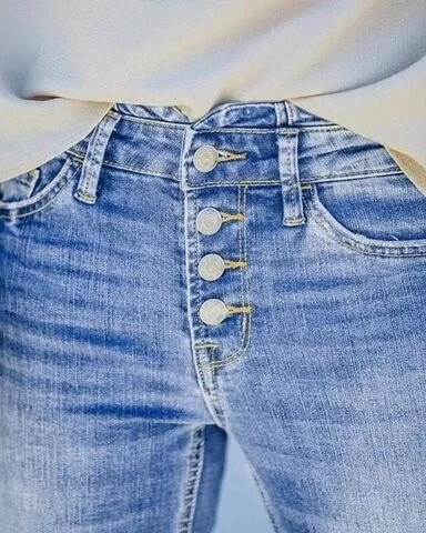 Vardagsjeans för damer: bootcut, hög midja och stretchig passform i en snygg ljusblå färg.