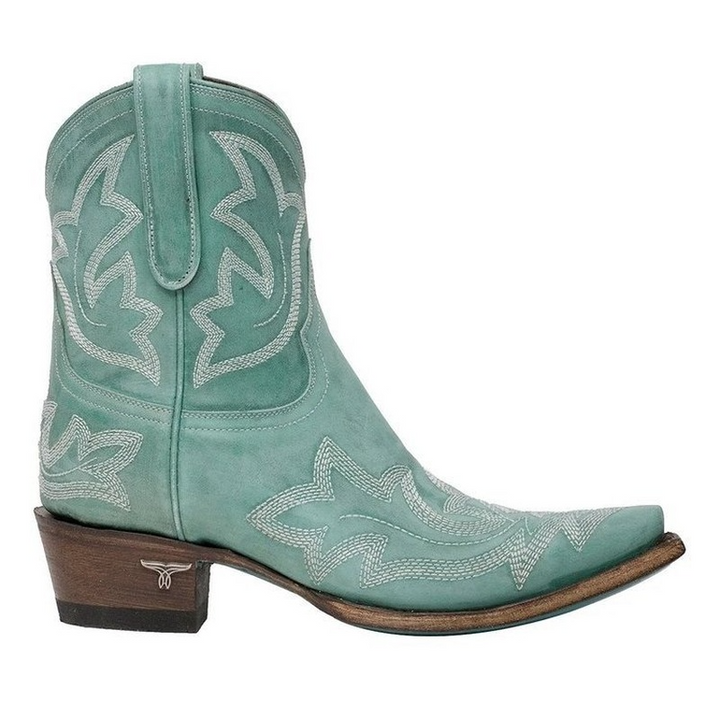 Eleganta bruna cowboystövlar för dam med detaljerad brodyr. Idealiska västernstövlar för höstens mode.