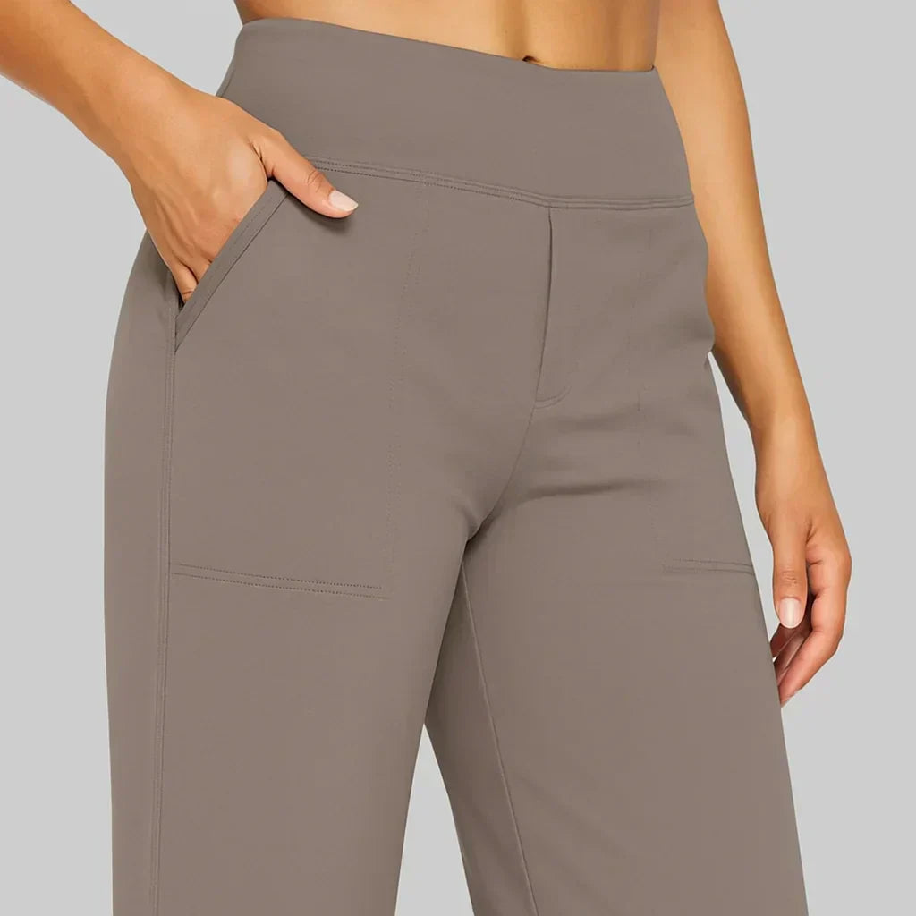 Vardagsbyxor med hög midja och fickor, bekväma dam byxor för en elegant look.