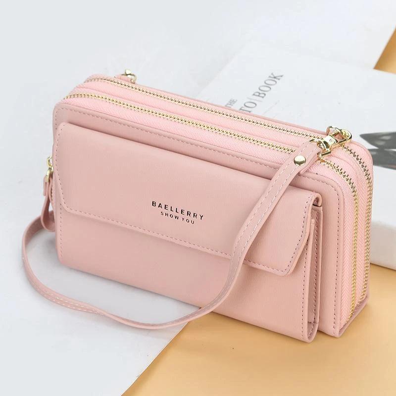 "Dam crossbody-väska av rosa PU-läder med stor kapacitet och flera fack, snygg och hållbar; perfekt för alla tillfällen."