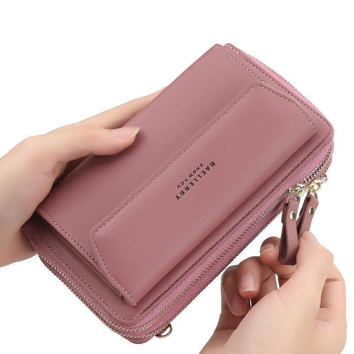 "Dam crossbody-väska av rosa PU-läder med stor kapacitet och flera fack, snygg och hållbar; perfekt för alla tillfällen."
