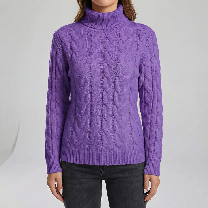 Modelbild: Dam i figursydd polotröja Holly. Varm, stickad tröja för en elegant stil.