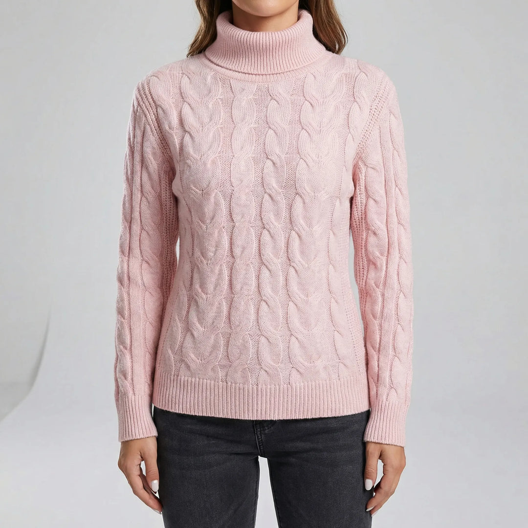 Långärmad figursydd polotröja för dam. Holly är en elegant och varm stickad tröja för vinter.