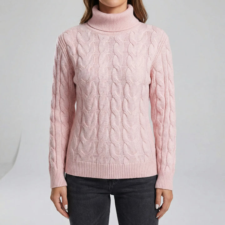 Långärmad figursydd polotröja för dam. Holly är en elegant och varm stickad tröja för vinter.
