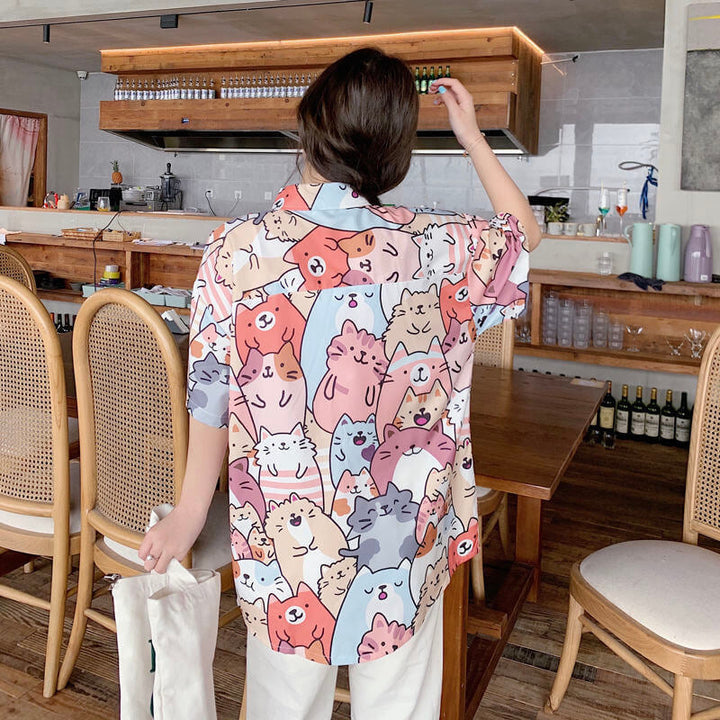 "Dam Happy Cat blus med kort ärm och kattmönster, bomullspolyester, luftig design för sommarstil."