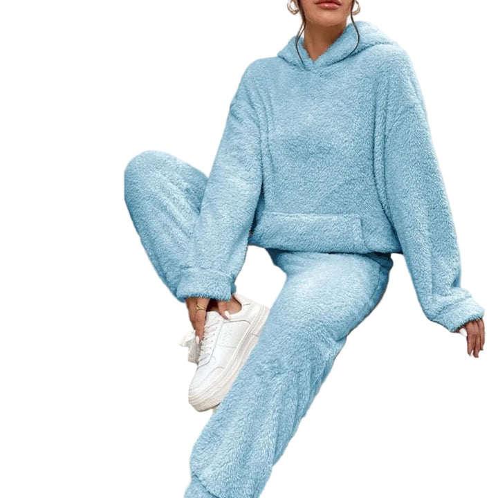 Dam loungeset med vårig hoodie och byxor i mjukt, bekvämt material, perfekt för hemmabruk.