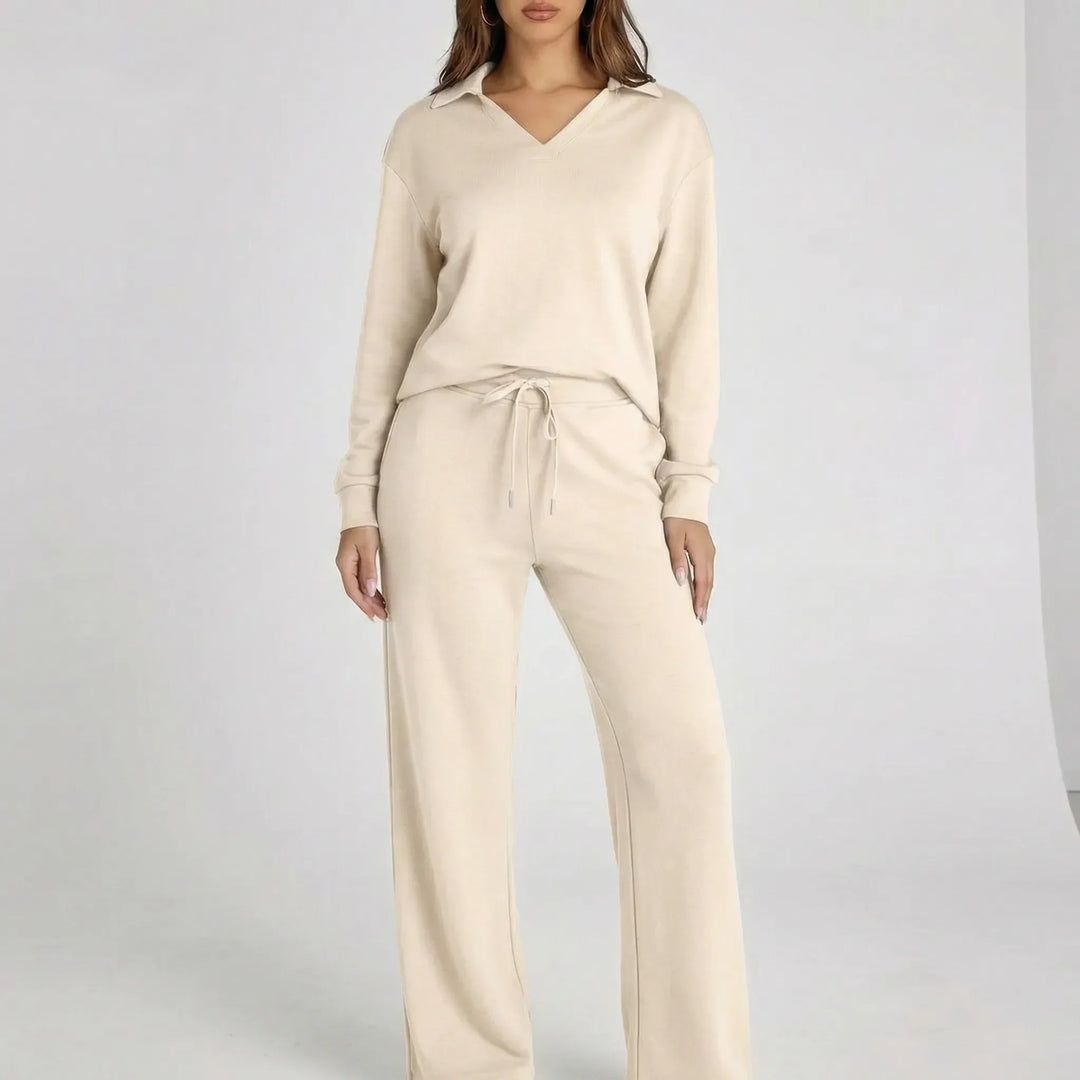 Modernt Gabriella dam loungewear set med vida byxor, ger en avslappnad men stilren look.