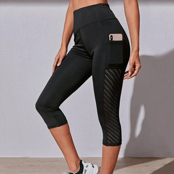 "Dam mesh yogabyxor med fickor, hög midja, sidomesh för andningsförmåga, stilrena och bekväma för träning och vardag."