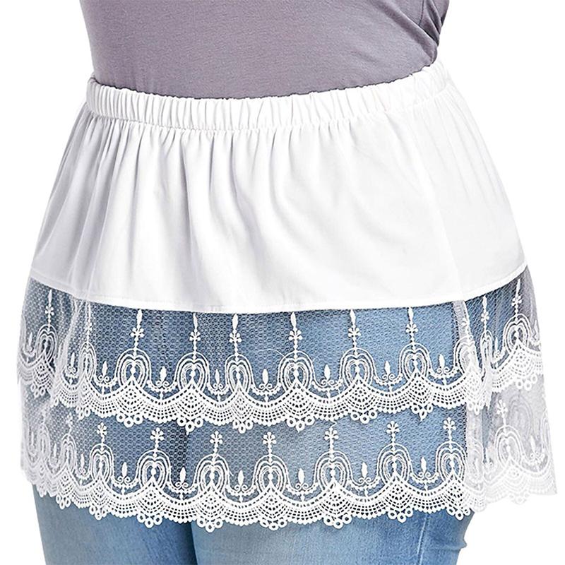 "Dam mini kjol skjortförlängare i polyester, elegant design i flera färger för en stilren look. Perfekt under korta toppar."