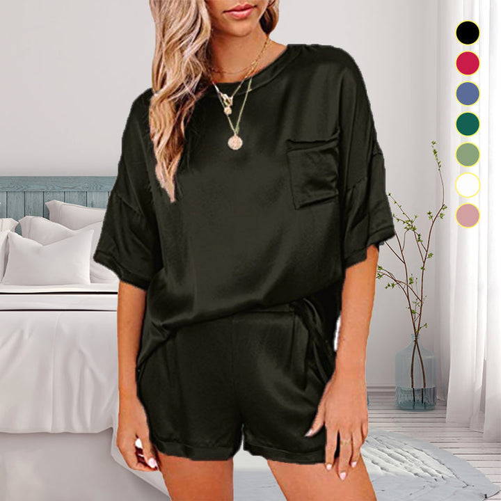 "Dam pyjamas set i enfärgad polyester, flera färgval, avslappnad passform med ficka, perfekt för komfort och stil."