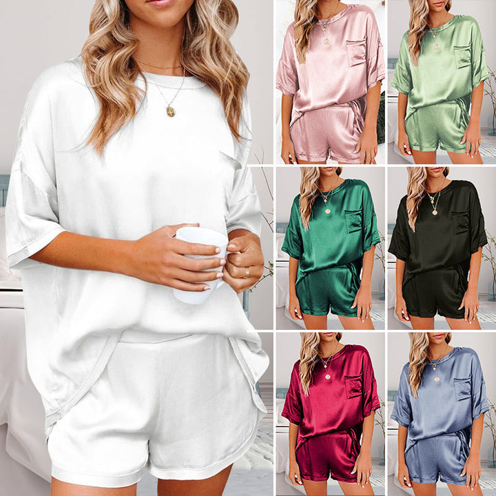 "Dam pyjamas set i enfärgad polyester, flera färgval, avslappnad passform med ficka, perfekt för komfort och stil."