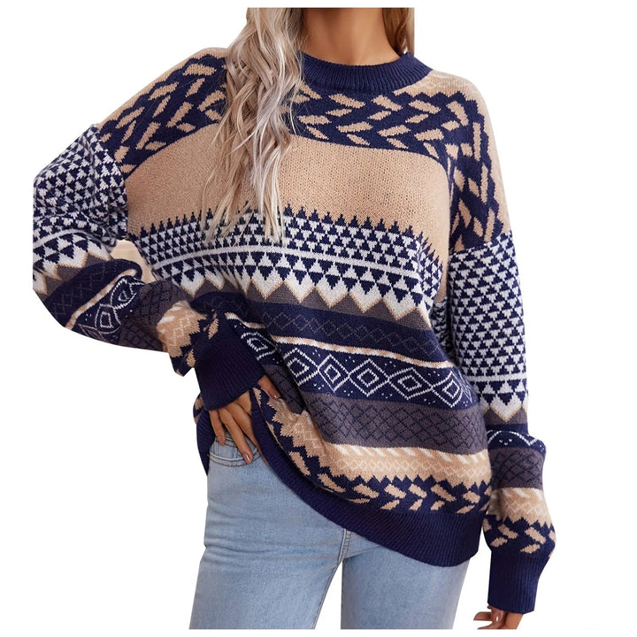 Elegant rundhalsad dam pullover, retro stickad med iögonfallande kontrastdetaljer.