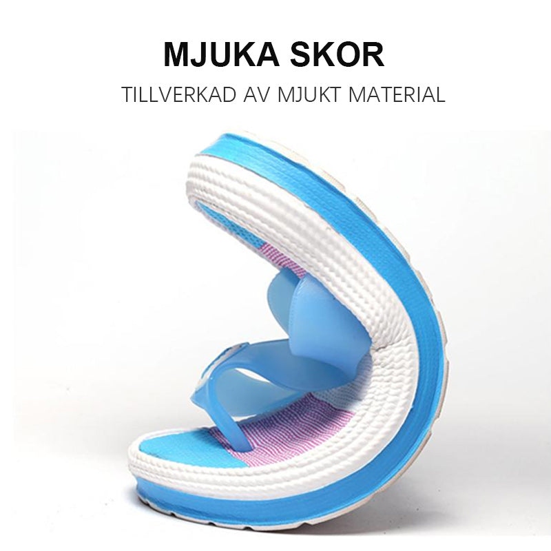 "Dam Soft Rainbow Flip-Flops Sandaler med färgglad design och mjuk EVA-sula, perfekta för både strand och vardagsbruk."