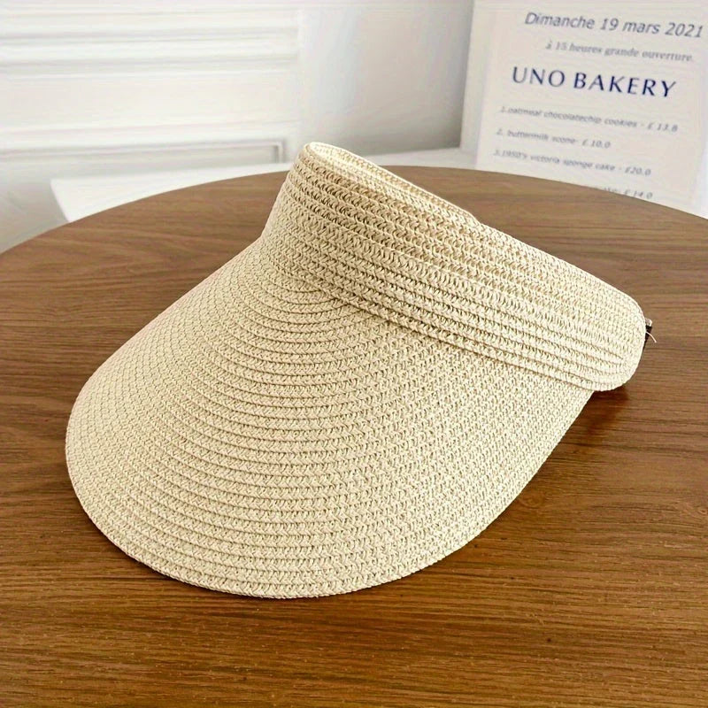 Snygg damhatt med brett brätte, vikbar solhatt. Passar perfekt som accessoar för semester och ger UV-skydd.