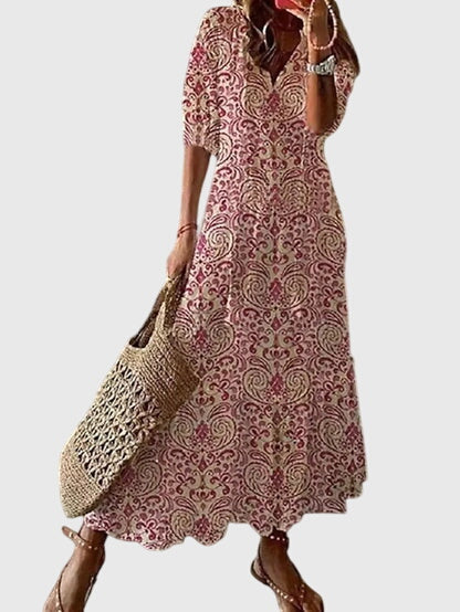 Boho sommarklänning dam med elegant V-ringning, idealisk för en avslappnad sommarlook.