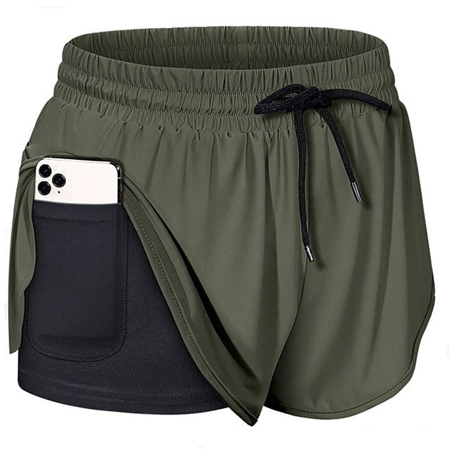 "Dam sportshorts i nylon och spandex, mjukt tyg, flera färger, avslappnad passform, perfekt för träning och fritid."