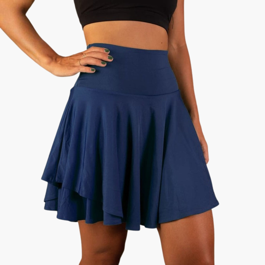 Dam sportskort med hög midja och inbyggda shorts för optimal komfort under träning och aktivitet.