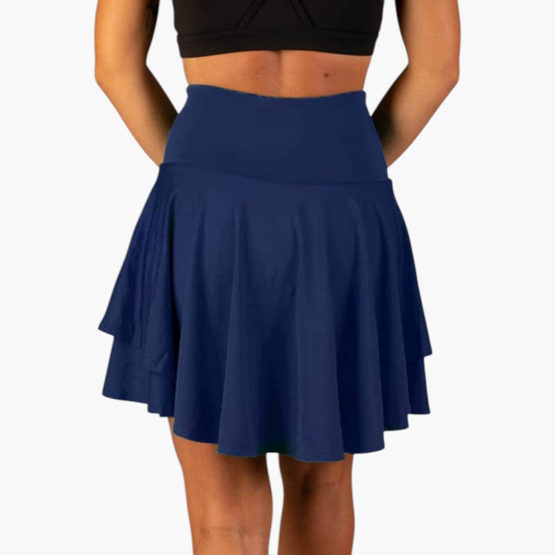 Bekväm dam sportskort/kjol med hög midja, dolda shorts och ficka, perfekt för kvinnors sportkläder.