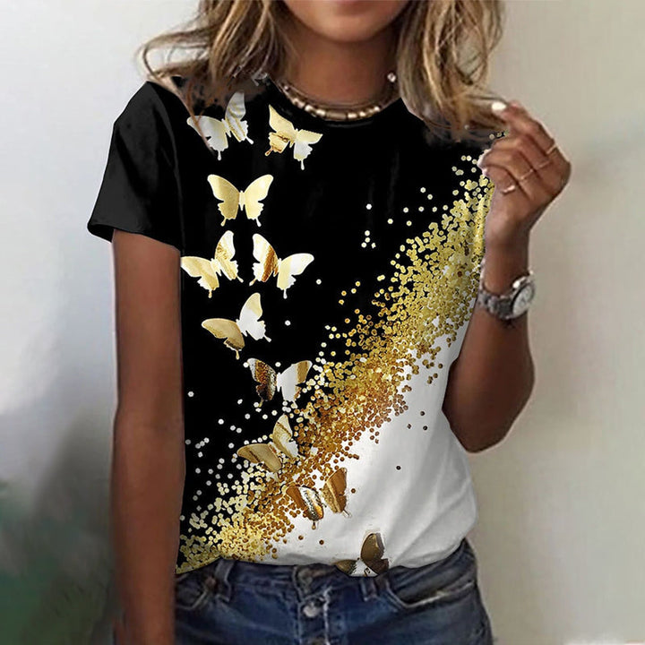 "Dam t-shirt med rund hals och kort ärm; grafiktryck av blommor och fjärilar, perfekt för vardagsbruk."