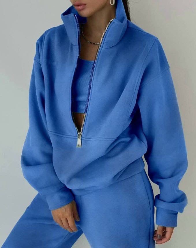 Bekvämt casual tvådelat set i sportig stil för kvinnor, med mysiga högmidjebyxor och överdel med dragkedja.
