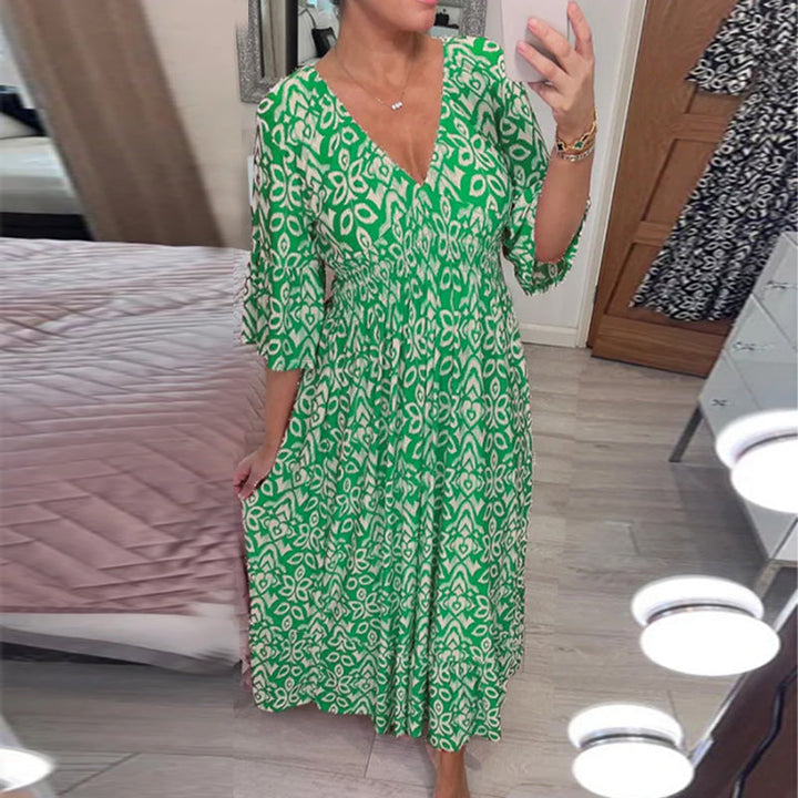 "Dam V-ringad A-linje klänning med utsvängda flare ärmar i elegant design, idealisk för vår- och sommarstilar."