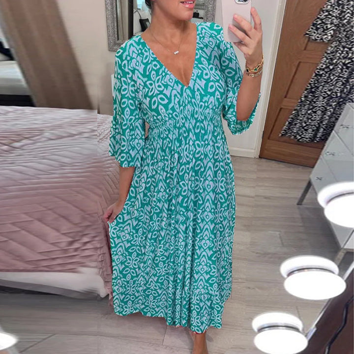 "Dam V-ringad A-linje klänning med utsvängda flare ärmar i elegant design, idealisk för vår- och sommarstilar."