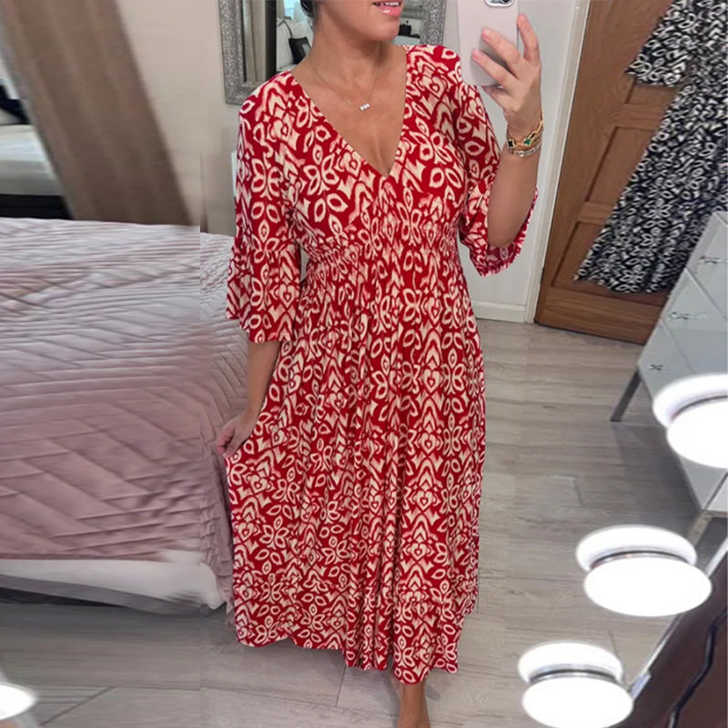 "Dam V-ringad A-linje klänning med utsvängda flare ärmar i elegant design, idealisk för vår- och sommarstilar."