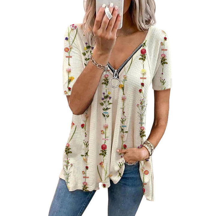 "Dam V-ringad blommig T-shirt med kortärmad design och modern dragkedja. Perfekt för sommarens vardagsbruk."