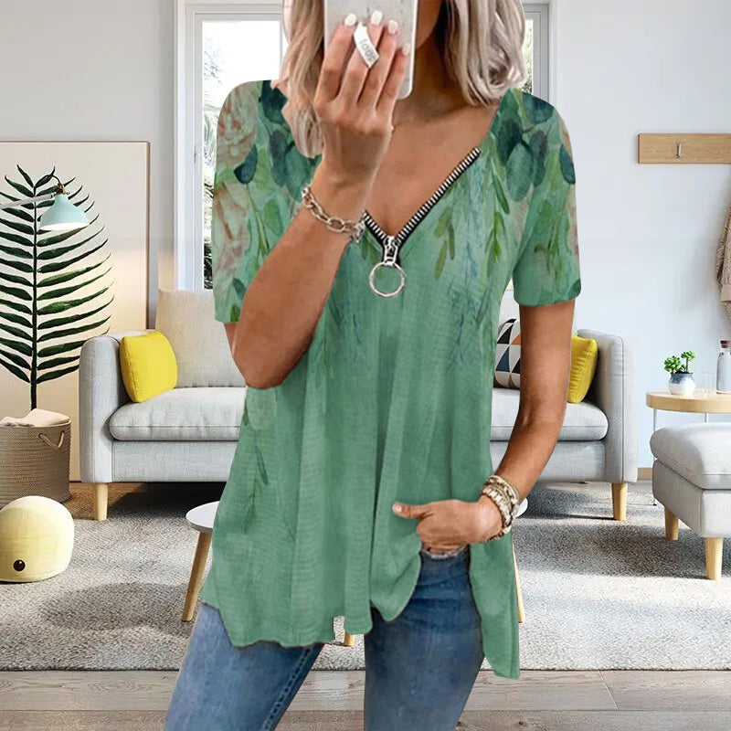 "Dam V-ringad blommig T-shirt med kortärmad design och modern dragkedja. Perfekt för sommarens vardagsbruk."
