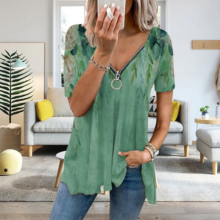 "Dam V-ringad blommig T-shirt med kortärmad design och modern dragkedja. Perfekt för sommarens vardagsbruk."