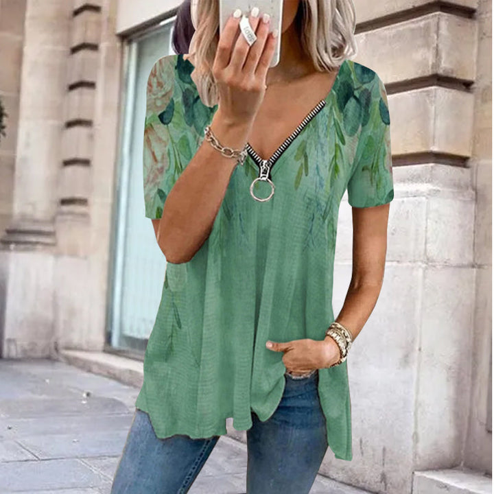 "Dam V-ringad blommig T-shirt med kortärmad design och modern dragkedja. Perfekt för sommarens vardagsbruk."