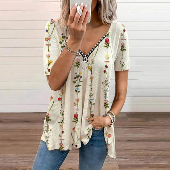 "Dam V-ringad blommig T-shirt med kortärmad design och modern dragkedja. Perfekt för sommarens vardagsbruk."