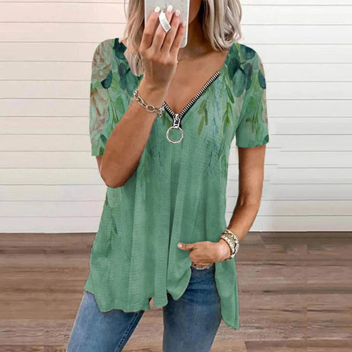 "Dam V-ringad blommig T-shirt med kortärmad design och modern dragkedja. Perfekt för sommarens vardagsbruk."