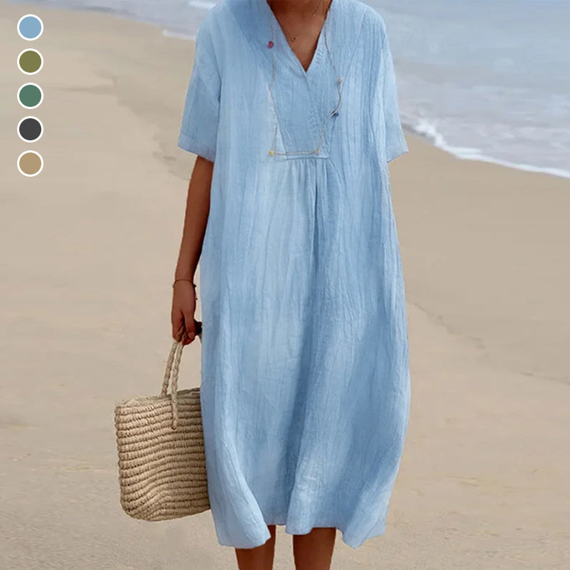 Dam V-ringad kortärmad enfärgad midi-klänning i mjuk bomull, perfekt för sommar, strand och vardag, chic och elegant.