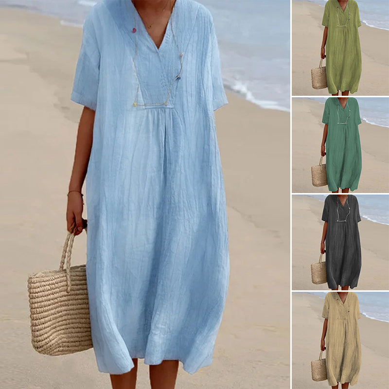 Dam V-ringad kortärmad enfärgad midi-klänning i mjuk bomull, perfekt för sommar, strand och vardag, chic och elegant.