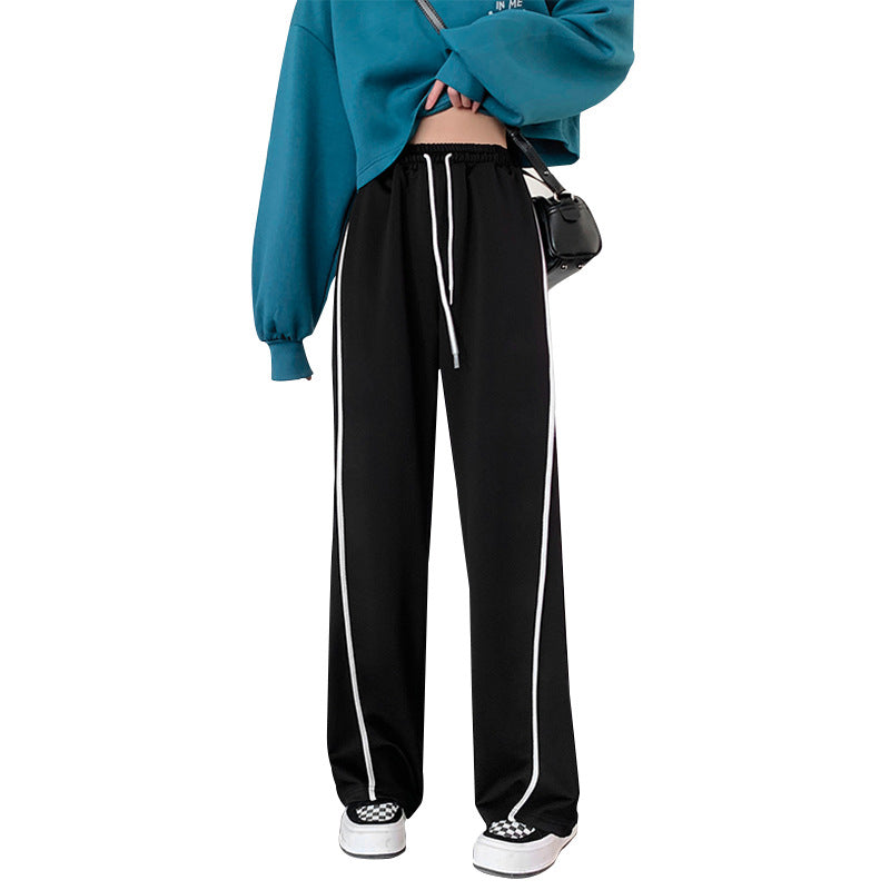 "Dam vida höga midjebyxor med randigt mönster i polyester, kontor och casual stil, framifrån visning."