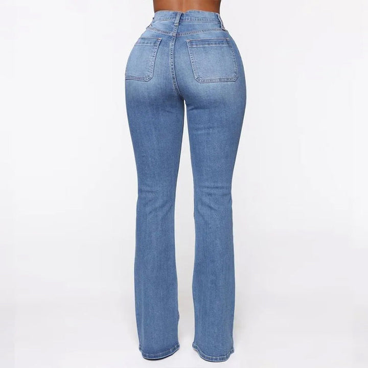 "Dambyxor i denim med hög midja och utsvängda ben, ljusblå nyans. Formande och bekväma för alla tillfällen."