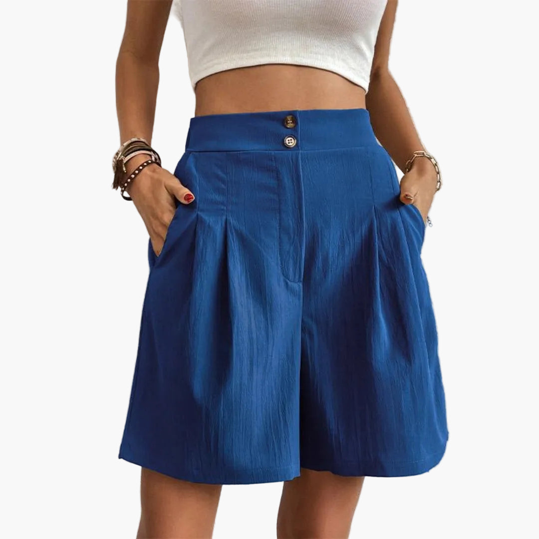 Chic dambyxor, hög midja, veckade. Vida ben för en avslappnad men elegant look.