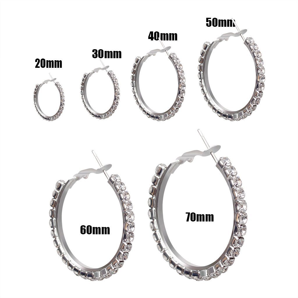 "Dameleganta örhängen i glänsande strass silver med tunnband design, perfekta för sofistikerad stil."
