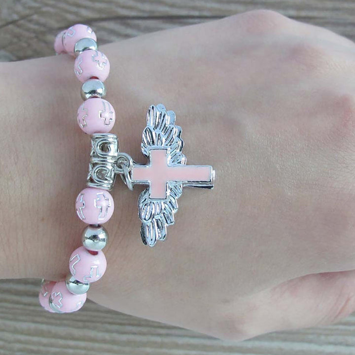 "Damer änglavingekorsarmband i akryl med 8 mm pärlor, rosa och vita färger, elegant och charmig med andlig symbolik."