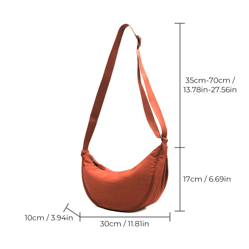 "Damer halvmåne crossbody-väska av slitstarkt nylon i gul färg med justerbar axelrem, stilren och praktisk."