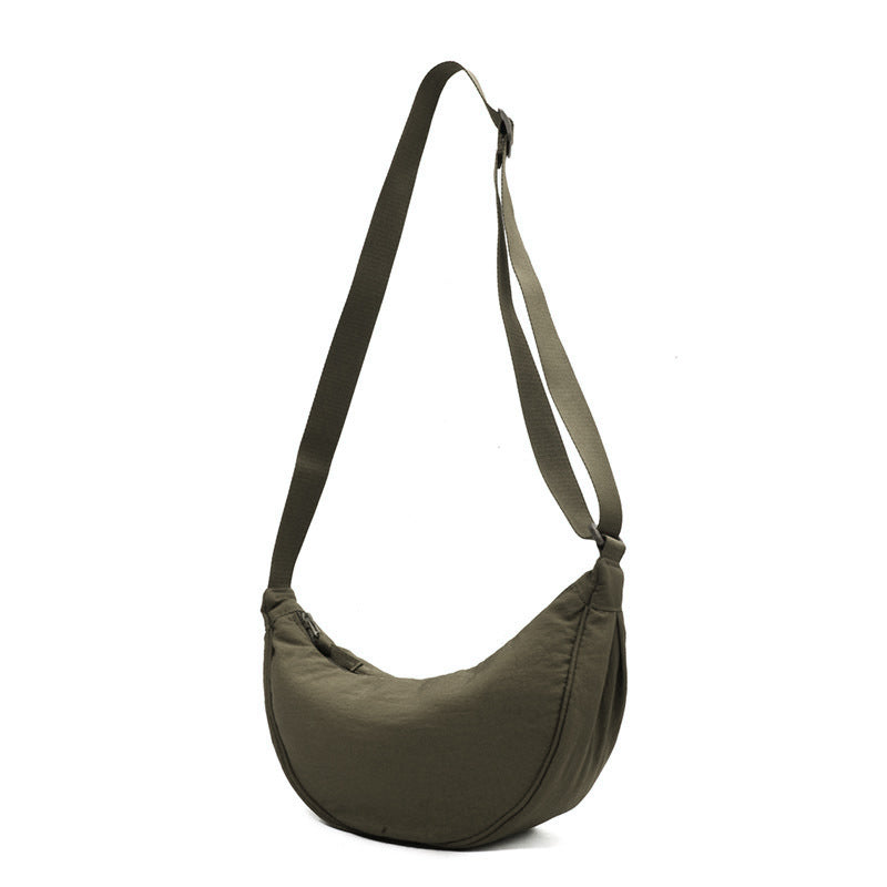 "Damer halvmåne crossbody-väska av slitstarkt nylon i gul färg med justerbar axelrem, stilren och praktisk."
